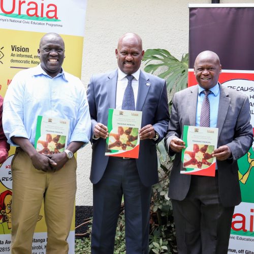 Mr. Josiah K. Musili, EBS – Secretary, National Cohesion and Values, and Mr. Oliver Waindi – Executive Director Uraia Trust received 450 copies of the National Values Training Manual published by the Uraia Trust.